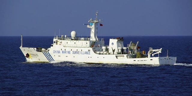 A Chinese maritime surveillance ship sails near a group of disputed islands in the East China Sea, October 25, 2012. A Chinese naval fleet has been spotted sailing for the first time through an international strait between northern Japan and Russia's far east, according to the Japanese defence ministry.