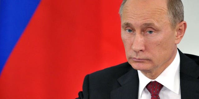 Russian President Vladimir Putin attends a press conference in Prokhorovka, on July 12, 2013. Putin has said US intelligence leaker Edward Snowden -- who has been stuck in a Moscow airport for three weeks -- would leave Russia as soon as he is able.