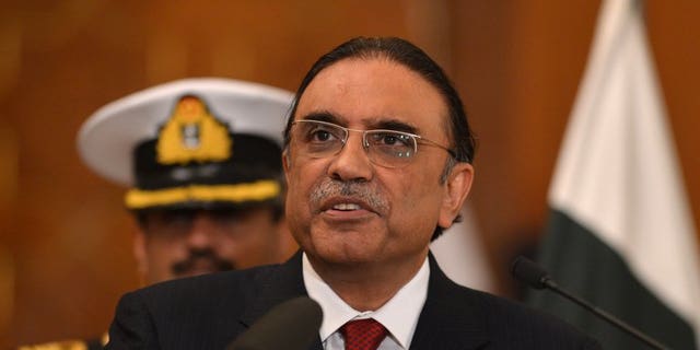 Pakistani President Asif Ali Zardari speaks during a joint press conference with unseen Chinese Premier Li Keqiang at the presidential palace in Islamabad on May 22, 2013. Pakistan's lawmakers will elect a new president on August 6, the election commission said Tuesday, to replace Asif Ali Zardari who will not stand for a second term.