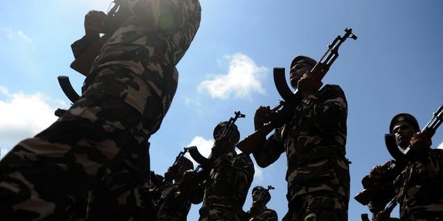 Sri Lankan Air Force Regiment soldiers march during a Victory Day parade rehearsal in Colombo on May 15, 2012. Britain has issued export licences worth ??12 billion ($18 billion, 14 billion euros) for the sale of military equipment to states deemed possible rights violators including Syria, Iran and China, and Sri Lanka, MPs said.