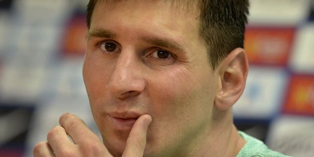 Barcelona's Leo Messi gives a press conference after taking part in a training session at Sant Joan Despi, on July 17, 2013. Messi says he is unconcerned about accusations of tax avoidance on income generated from the sale of his image rights and was confident his lawyers will solve the case.