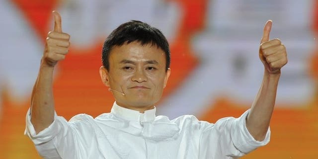 Alibaba founder Jack Ma thanks the crowd after speaking in Hangzhou, on May 10, 2013. Activists have called on Ma to apologise over remarks in which he appeared to condone the bloody Tiananmen Square crackdown in 1989.