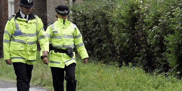 Police patrol in east Sussex, in southern England, on September 3, 2006. British police on Wednesday said they had found the body of an actor who appeared in James Bond film "Casino Royal", who went missing in London last Wednesday.