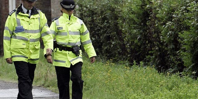 Police patrol in east Sussex, in southern England, on September 3, 2006. British police on Wednesday said they had found the body of an actor who appeared in James Bond film "Casino Royal", who went missing in London last Wednesday.
