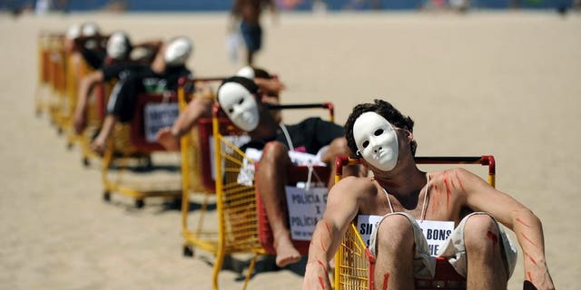 People demonstrate against violence at Copacabana beach in Rio de Janeiro on October 24, 2009. More than one million people were murdered in Brazil between 1980 and 2011, making it the world's seventh most violent country, a survey showed Thursday.