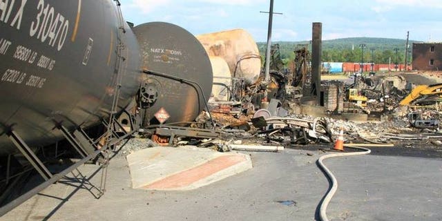 This undated picture released by Quebec police (Surete du Quebec) on July 12, 2013 shows derailed train wagons in Lac-Megantic following the derailment and explosion of a train loaded with crude oil on July 6. Police announced Thursday they had found four more bodies amid the ruins of Lac-Megantic, bringing the body count to 42.
