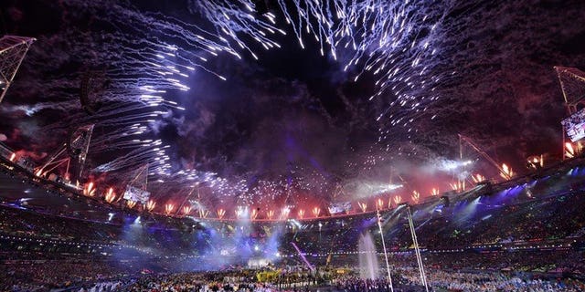Fireworks light up the sky above the Olympic Stadium during the closing ceremony of the London 2012 Paralympic Games, on September 9, 2012. The Olympic Games in London last year gave the British economy a boost worth $15 billion, the government said on Friday, a figure far higher than the cost of staging the event.