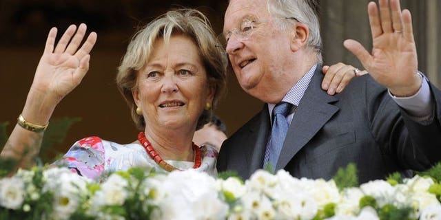 King Albert II of Belgium and Queen Paola wave to the crowd on July 19, 2013 during a visit in Eupen in Liege. The visit to the southern Belgian city was Albert's last in 20 years of a reign that comes to a close Sunday.