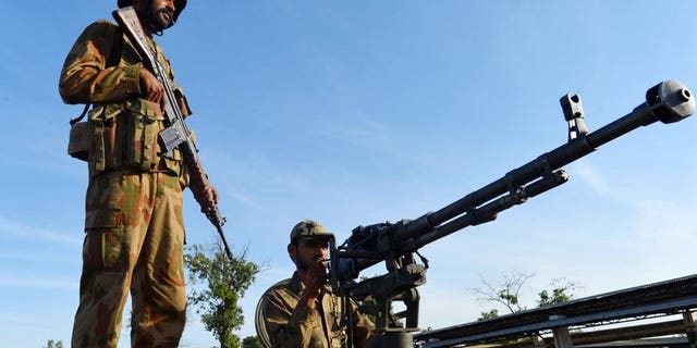 Pakistani troops patrol the streets of Nowshera, a district in the Khyber Pakhtunkhwa province, on May 9, 2013. Tribal elders and Islamic clerics in northwest Pakistan have barred women from shopping in bazaars without a male relative, elders and an official tell AFP.