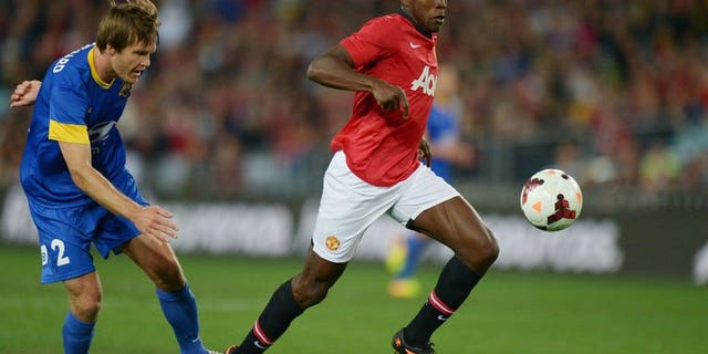 Danny Welbeck (right) of Manchester United football club breaks clear during the tour match against the Foxtel A-league Allstars in Sydney on July 20, 2013.