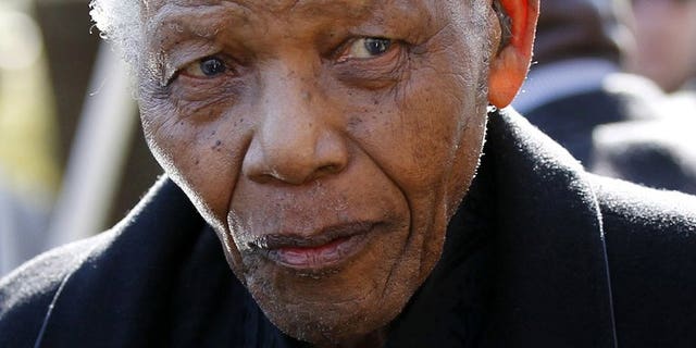 A picture taken on June 17, 2010 shows global icon Nelson Mandela arriving for a funeral, just north of Johannesburg. Mandela who celebrated his 95th birthday this week remained in hospital on Saturday, six weeks after he was admitted for treatment for a lung illness.