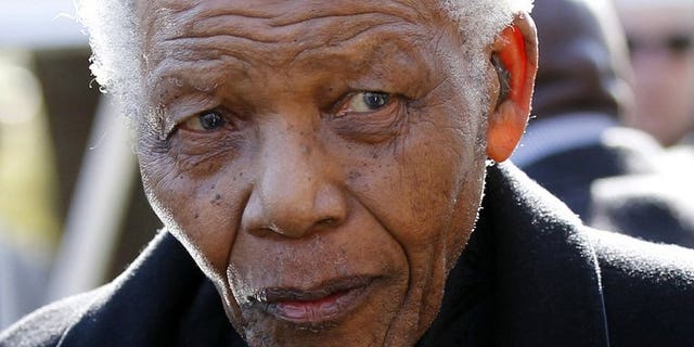 A picture taken on June 17, 2010 shows global icon Nelson Mandela arriving for a funeral, just north of Johannesburg. Mandela who celebrated his 95th birthday this week remained in hospital on Saturday, six weeks after he was admitted for treatment for a lung illness.