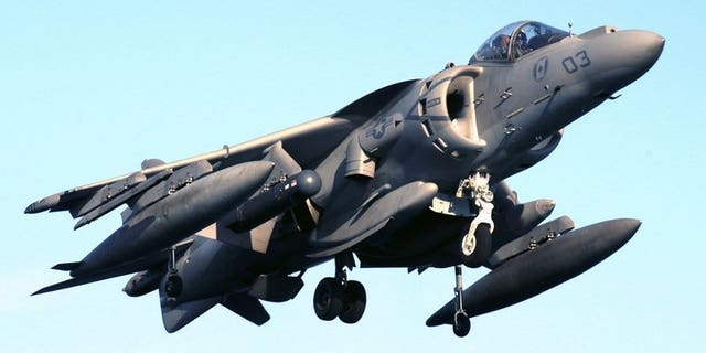This file photo, released by US Navy, shows an AV-8B Harrier jet preparing to land on the flight deck of an amphibious assault ship. Similar jets dropped four unarmed bombs on Australia's Great Barrier Reef on July 16, 2013, in an "emergency jettison" during a training exercise, officials said, ruling out any risk to the public or environment.