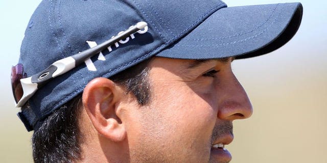 India's Shiv Kapur is pictured during the third round of the 2013 British Open Golf championship at Muirfield golf course in Scotland on July 20, 2013. The golfer will take away bittersweet memories from the tournament after ending his campaign with an even-par 71.