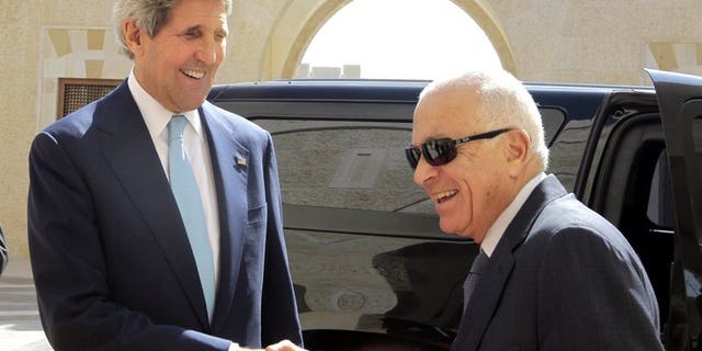 US Secretary of State John Kerry (left) shakes hands with Arab League chief Nabil el-Araby ahead of talks at the Hummar Palace in Amman, on July 17, 2013. The Arab League says it supports the Palestinian stance on the announcement of resumed peace talks with Israel, but that it was sceptical of Israeli intentions.