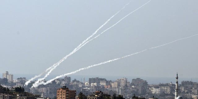 A trail of smoke is seen as a rocket is launched from the Gaza Strip towards southern Israel, on October 24, 2012.