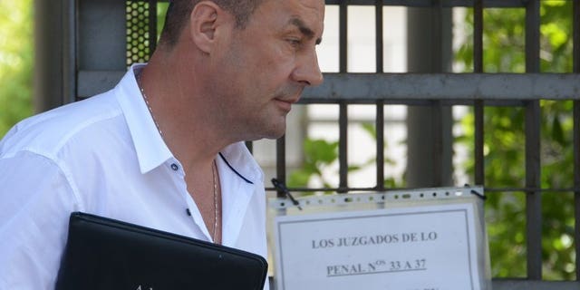 John Tomic, the father and coach of Australian tennis player Bernard Tomic, leaves the courthouse of Madrid after his trial on July 22, 2013. Tomic appeared in a Madrid court on Monday over the alleged assault of his son's training partner Thomas Drouet.