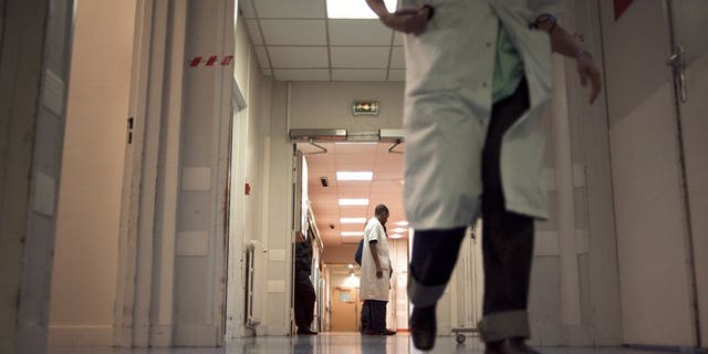 A rare infection resulting from a dog bite cost an Ottawa woman her left arm and both legs, a Canadian newspaper said.