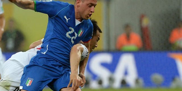 Emanuele Giaccherini (front) fights for the ball during a FIFA Confederations Cup match, in Recife, Brazil, on June 19, 2013. Sunderland manager Paolo Di Canio has lavished praise on new signing Giaccherini, calling him one of the best players in Europe.