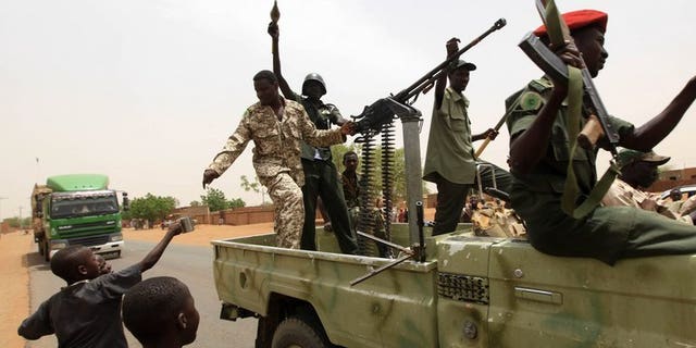 Sudanese army soldiers pictured in Abu Kershola in South Kordofan after capturing the town from Sudan Revolutionary Front rebels, May 28, 2013. Sudanese rebels clashed with troops in North Kordofan Wednesday, both sides said, days before a Khartoum deadline to halt South Sudan's oil exports over allegations it is backing the insurgents.