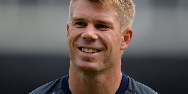Australia's David Warner warms up at Edgbaston in Birmingham, central England on June 12, 2013. Controversial batsman Warner sent a timely reminder to the struggling Ashes team with a 193-run innings against South Africa A Wednesday in Pretoria.