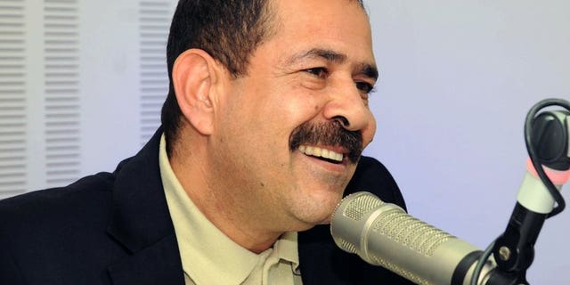 A picture taken on November 20, 2012 shows late Tunisian lawyer Chokri Belaid speaking during a radio interview in Tunis. Six people believed to have orchestrated the killing of an opposition figure whose assassination in February plunged Tunisia into a major political crisis have been identified, a minister said Wednesday.