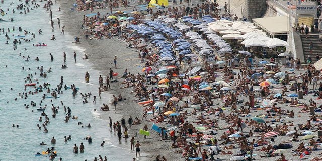 A picture taken on August 22, 2012 shows the beach in Nice, southeastern France. A 16-year-old British boy has disappeared while swimming off the southwestern coast of France and is unlikely to be found alive, maritime officials say.