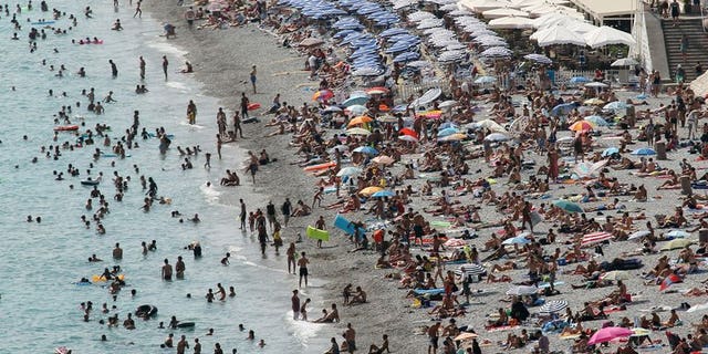 A picture taken on August 22, 2012 shows the beach in Nice, southeastern France. A 16-year-old British boy has disappeared while swimming off the southwestern coast of France and is unlikely to be found alive, maritime officials say.