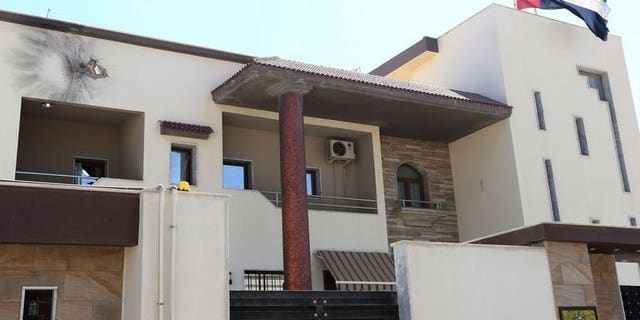 Photo shows a hole in the wall of the United Arab Emirates' (UAE) embassy building in Tripoli on July 24, 2013. Unknown attackers fired a rocket at the UAE embassy in the Libyan capital causing little damage and no casualties, the interior ministry said, in the latest assault targeting foreign missions in the country.