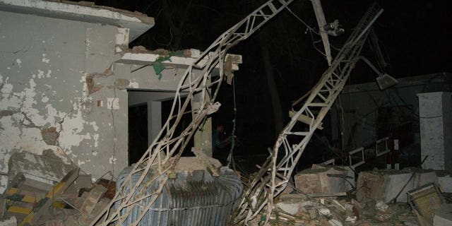 A damaged building is pictured at the site of suicide car bombing in the southern city of Sukkur on July 24, 2013. The death toll has risen to nine.