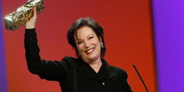 French actress Bernadette Lafont smiles as she receives the Honorary Cesar during the 28th Cesar Awards ceremony in Paris, February 22, 2003. Lafont died on July 25, 2013 in Nimes, southern France.