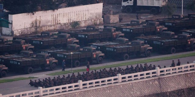 North Korean army vehicles line up during preparations for a militay parade in Pyongyang, early morning on July 27, 2013. N.Korea is staging a major military parade to mark the 60th anniversary of the Korean War ceasefire.
