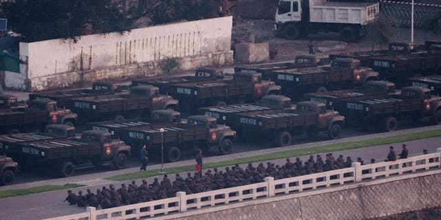 North Korean army vehicles line up during preparations for a militay parade in Pyongyang, early morning on July 27, 2013. N.Korea is staging a major military parade to mark the 60th anniversary of the Korean War ceasefire.