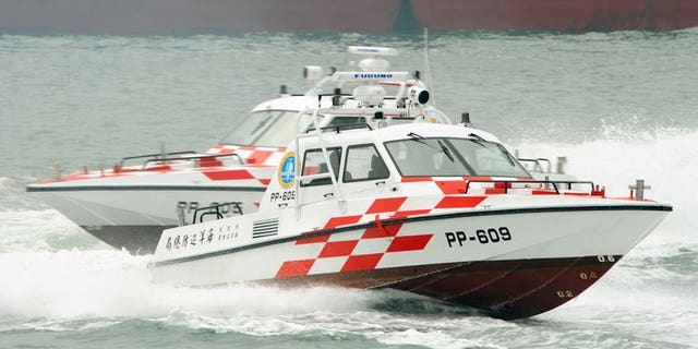 In this file photo, Taiwan coastguard's speed-boats demonstrate their combat skills during a drill near New Taipei City, on June 29, 2011. The coastguard on Saturday raided a fishing vessel thousands of miles offshore, arresting nine Indonesian crew suspected of murdering their Taiwanese captain and chief engineer, according to officials.