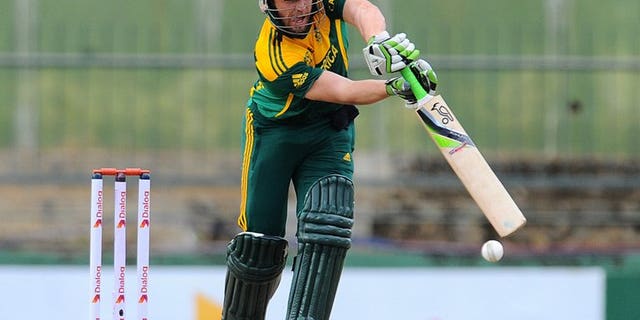 South African cricket team captain AB de Villiers plays a shot during the third One Day International (ODI) cricket match between Sri Lanka and South Africa at the Pallekele International Cricket Stadium in Pallekele on July 26, 2013. He won the toss and elected to bat in the fourth one-day international against hosts Sri Lanka in Pallekele on Sunday.