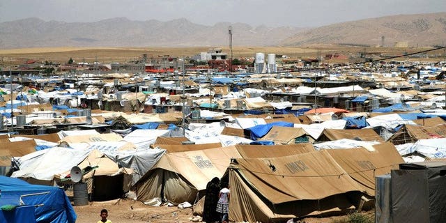 The Domiz refugee camp, which houses Syrian-Kurd refugees, near the Iraqi city of Dohuk. The head of the main Syrian Kurdish party said Sunday that Turkey had changed its position and would provide the Kurds in the war-ravaged country with humanitarian aid.
