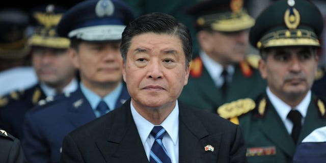 This file photo shows Taiwan's Defence Minister Kao Hua-chu during his recent visit to Paraguay, on July 9, 2013. Kao has resigned, Premier Jiang Yi-huah said on Monday, after the death of a corporal who was allegedly abused by the military in a case that sparked outrage across the island.