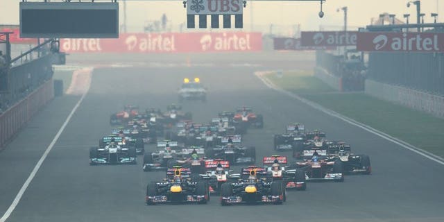 Drivers leave the starting grid at the start of the Formula One Indian Grand Prix in Greater Noida, on the outskirts of New Delhi on October 28, 2012. Political and financial issues could threaten next year's Indian and South Korean grand prix, as Formula One paymaster Bernie Ecclestone looks to add new races in the United States, Russia and Austria.