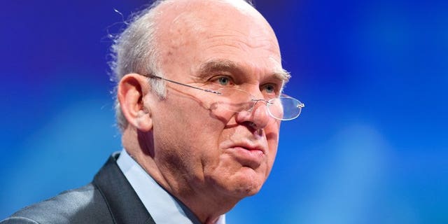 Vince Cable at a conference in London last year. The government on Monday defended a controversial campaign featuring lorries with billboards urging illegal immigrants to "go home or face arrest", after the Business secretary criticised the scheme.