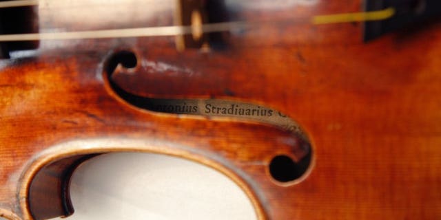 A Stradivarius violin is pictured at the Musee de la Musique in Paris, on December 3, 2009. British police have recovered a rare Stradivarius violin worth ??1.2 million ($1.8 million, 1.4 million euros) that was stolen from its owner in a London railway cafe in 2010.