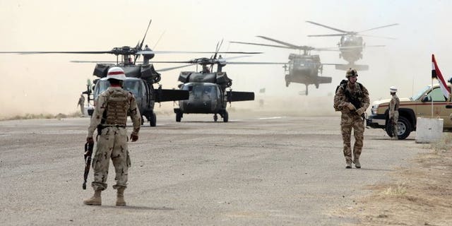 A British soldier is seen in Iraq in 2009. A third British soldier taken ill earlier this month during a gruelling training exercise for entry into the elite SAS unit has died, the Ministry of Defence (MoD).