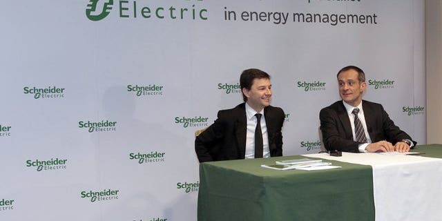 Schneider CEO Jean-Pascal Tricoire (right) and finance director Emmanuel Babeau in Paris in February 2010. French electrical engineering and equipment group Schneider is to make an agreed bid worth ??3.4 billion for British engineering firm Invensys, the two firms said on Wednesday.