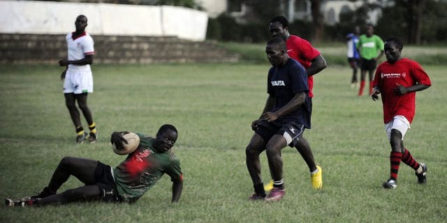 Rugby sevens Kenyan national team players take part in a training session on November 2, 2012 in Nairobi. Mike Friday resigned as Kenya Sevens head coach on Wednesday, citing too much interference in his work and disatisfaction over the lack of funding for the national team.