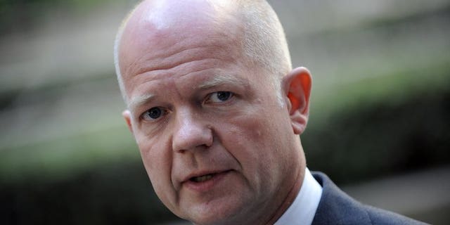 Britain's Foreign Secretary William Hague answers journalists' questions on July 22, 2013 in Brussels. Britain on Saturday expressed 'serious' doubt over the credibility of Zimbabwe's election results, after President Robert Mugabe won a landslide victory among complaints by the opposition of widespread fraud. "We have grave concerns over the conduct of the election," Hague said in a statement.