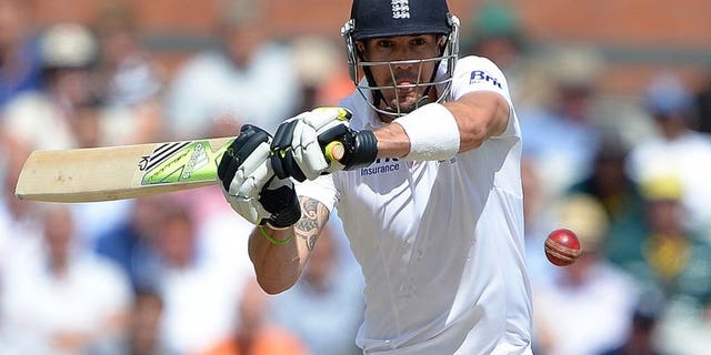 England's Kevin Pietersen plays a shot during play on the third day of the third AshesTest match between England and Australia at Old Trafford in Manchester on August 3, 2013. England avoided the follow-on on the fourth day of the third Test against Australia at Old Trafford.