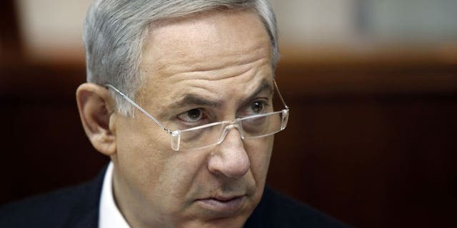 Israeli Prime Minister Benjamin Netanyahu opens the weekly cabinet meeting in Jerusalem, on August 4, 2013. Netanyahu has lashed out at new Iranian President Hassan Rowhani, saying that he shared his hardline predecessor's aim of destroying the Jewish state.