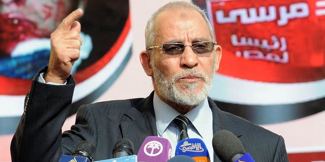 Muslim Brotherhood leader Mohammed Badie speaks during a press conference at the party's headquarters in Cairo on August 8, 2012. An Egyptian court set an August 25 trial date for the Muslim Brotherhood chief, his two deputies and three other group members for their alleged involvement in protesters' deaths.