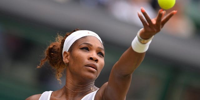 US player Serena Williams serves in Wimbledon, southwest London, on July 1, 2013. Williams is eager to test herself against the world's best, including Wimbledon champion Marion Bartoli, at the WTA Tour's Rogers Cup that starts on Monday.
