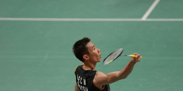 Lee Chong Wei of Malaysia plays a return during the Indonesia Open in Jakarta on June 13, 2013. Lee eased his way through the first round of the BWF World Championships on Monday, taking just 27 minutes to dismiss his opponent.