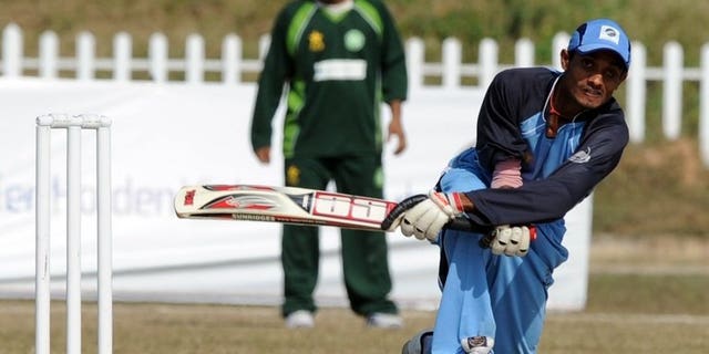 Visually impaired Indian cricketer Ganesh (R) plays a shot during their third and final blind cricket one-day international match between Pakistan and India in Islamabad on November 26, 2011. The body running cricket for the blind in Pakistan said Monday it has persuaded its counterparts in India to come on tour in February next year.